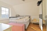 Ländliches Wohnen in den Vierlanden: "Gemütliche 3-Zimmer-Dachgeschosswohnung in Hamburg-Curslack" - Gemütliches Schlafzimmer