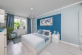 Gut geschnittenes Schlafzimmer - Zentral gelegen in Wentorf: „Vermietete 2‑Zimmer-Wohnung mit Südterrasse und Gartenanteil“