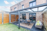 Überdachte Terrasse - Modernes Wohnen: „Energieeffizientes Stadtreihenhaus in familienfreundlicher Lage“