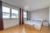 Großzügiges Schlafzimmer - Wohnen in familienfreundlicher Umgebung: „Modernes Reihenmittelhaus im schönen Börnsen“
