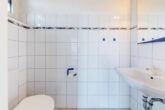 Gäste-WC - Ihr neues Zuhause: „Charmantes Mittelreihenhaus mit Vollkeller und Garage in Wentorf“