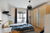 Geräumiges Schlafzimmer - Top modern: „Stilvolle 2‑Zimmer-Erdgeschosswohnung in Reinbek-Neuschönningstedt“