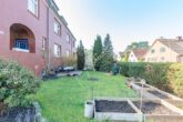 In zentraler Lage von Geesthacht: "Gepflegtes, teilvermietetes Mehrfamilienhaus" - Gartenfläche vor dem Haus ...