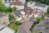 Eine einmalige Chance: "Grundstück mit Bestand im Herzen von Reinbek" - Rückansicht mit Garten
