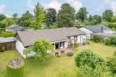 Objektbild - Amerikanischer Komfort-Bungalow: „Großzügiges Grundstück mit viel Potenzial“