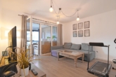 Geräumiges Wohnzimmer - Modern und gut gelegen: „Gemütliche 3‑Zimmer-Erdgeschosswohnung mit Wintergarten“